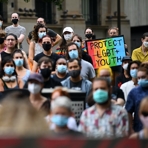 Protesters march during a snap rally opposing the federal Religious Discrimination Bill at the State Library of Victoria in Melbourne, 9 February, 2022.