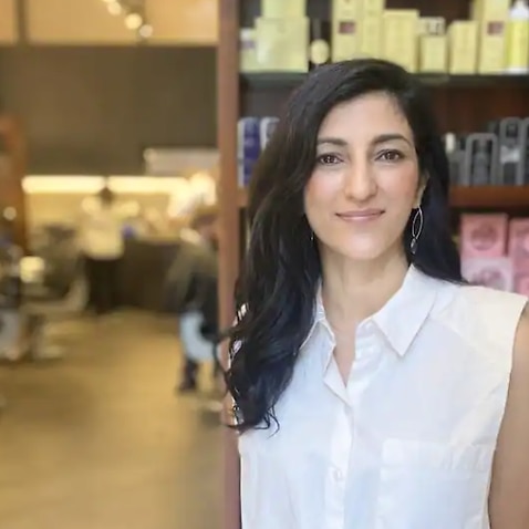 Sydney barbershop owner Renee Baltov is struggling to find workers.