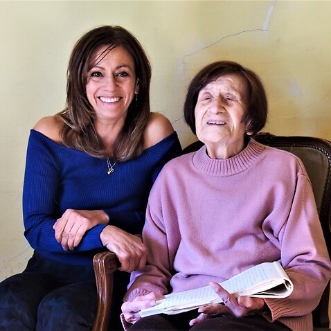 Helena Kidd and her mother, Maria Avraam holding her original diary. 
