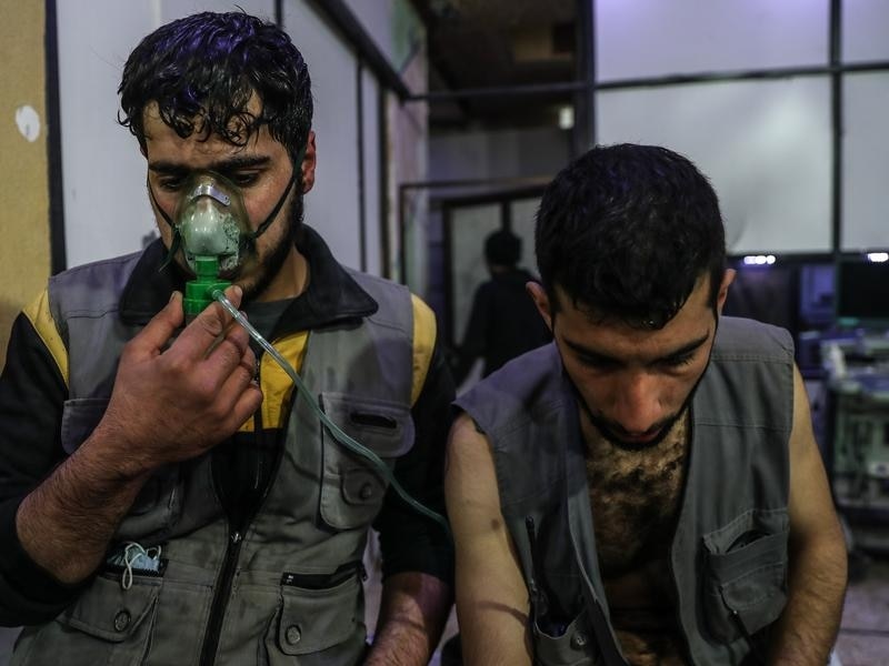 Affected volunteers receive treatment after a gas attack on al-Shifunieh village, in Eastern Ghouta.
