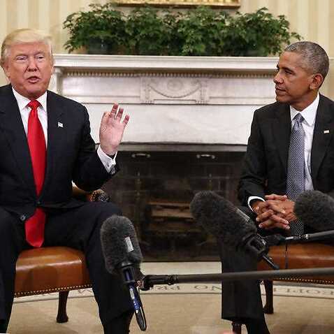 President Barack Obama listens as President-elect Donald Trump speaks during their meeting in the Oval Office of the White House in Washington, Thursday, Nov. 1