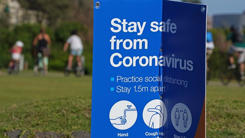 A Stay Safe from Coronavirus sign is seen at Elwood beach in Melbourne