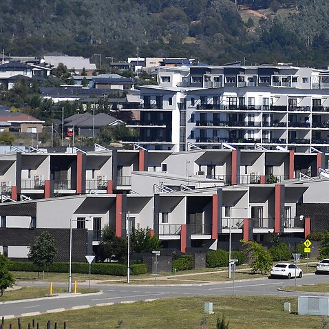 New apartment buildings are seen on a housing estate in the Canberra suburb of Wright, Tuesday, March 2, 2021. According the the Australian Bureau of Statistics, the seasonally adjusted estimate for total dwellings approved fell 19.4% in January.