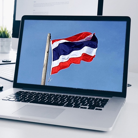 Image of a laptop computer displaying the flag of Thailand