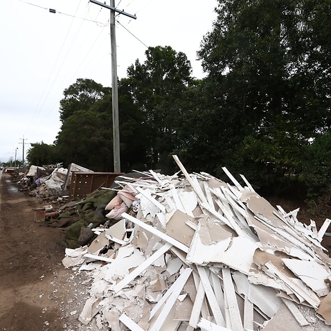 Rubbish from homes and debris from recent flooding at Tweed Valley in Murwillumbah, 848 km north-east of Sydney, Friday, March 11, 2022. (AAP Image/Jason O'Brien) NO ARCHIVING