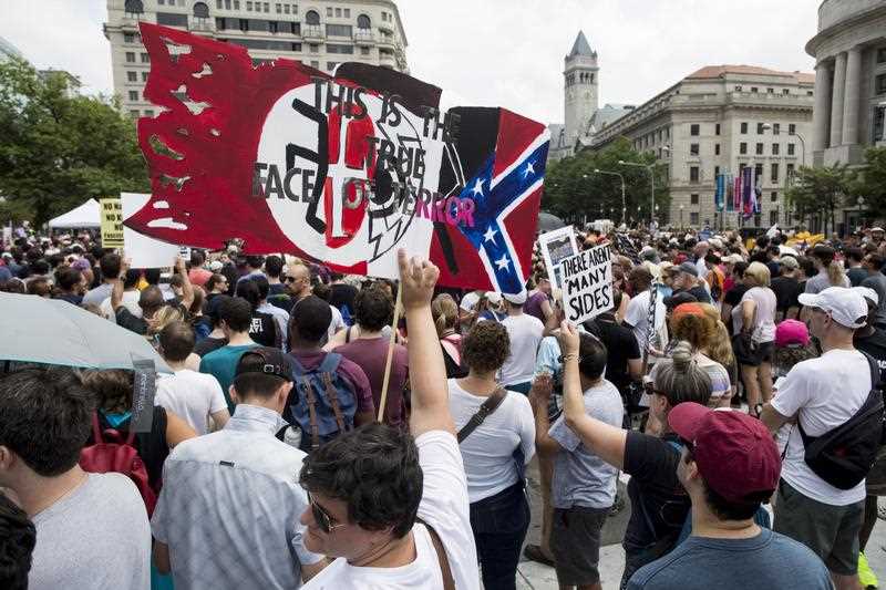 People gather on Freedom Plaza to join a counterprotest to the Unite the Right rally in Washington, DC, USA, 12 August 2018. 