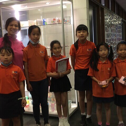 Students and Ms Tam before festival breaks at Richmond West Primary School in Melbourne
