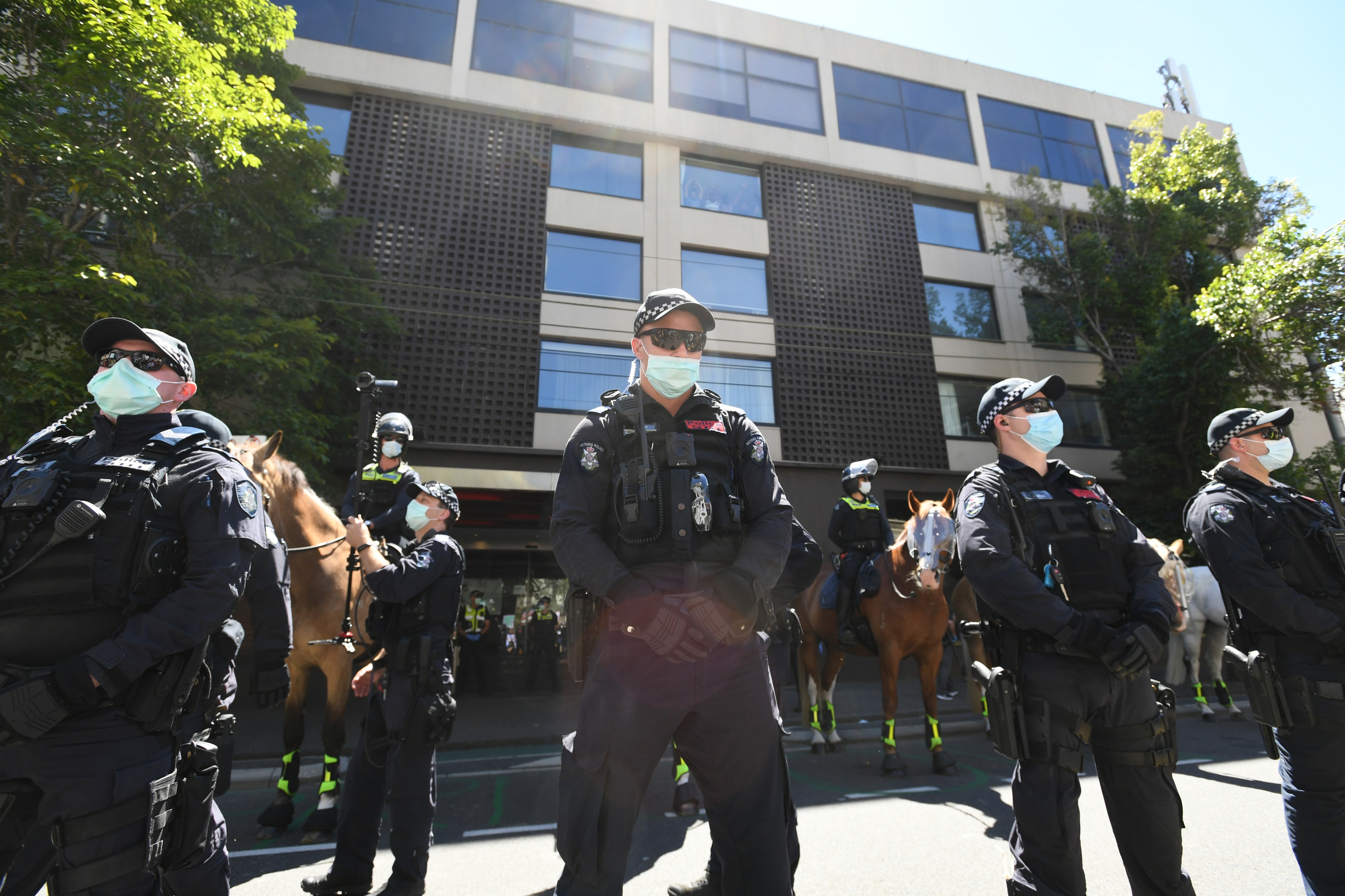 Police are seen outside the the Park Hotel in Melbourne, Saturday, January 09, 2021