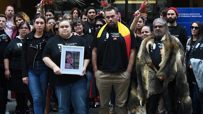 (L-R) Apryl Day, Belinda Day, Warren Day and Tanya's brother Russell Day (in possum cloak) are seen outside the Coroners Court in Melbourne.