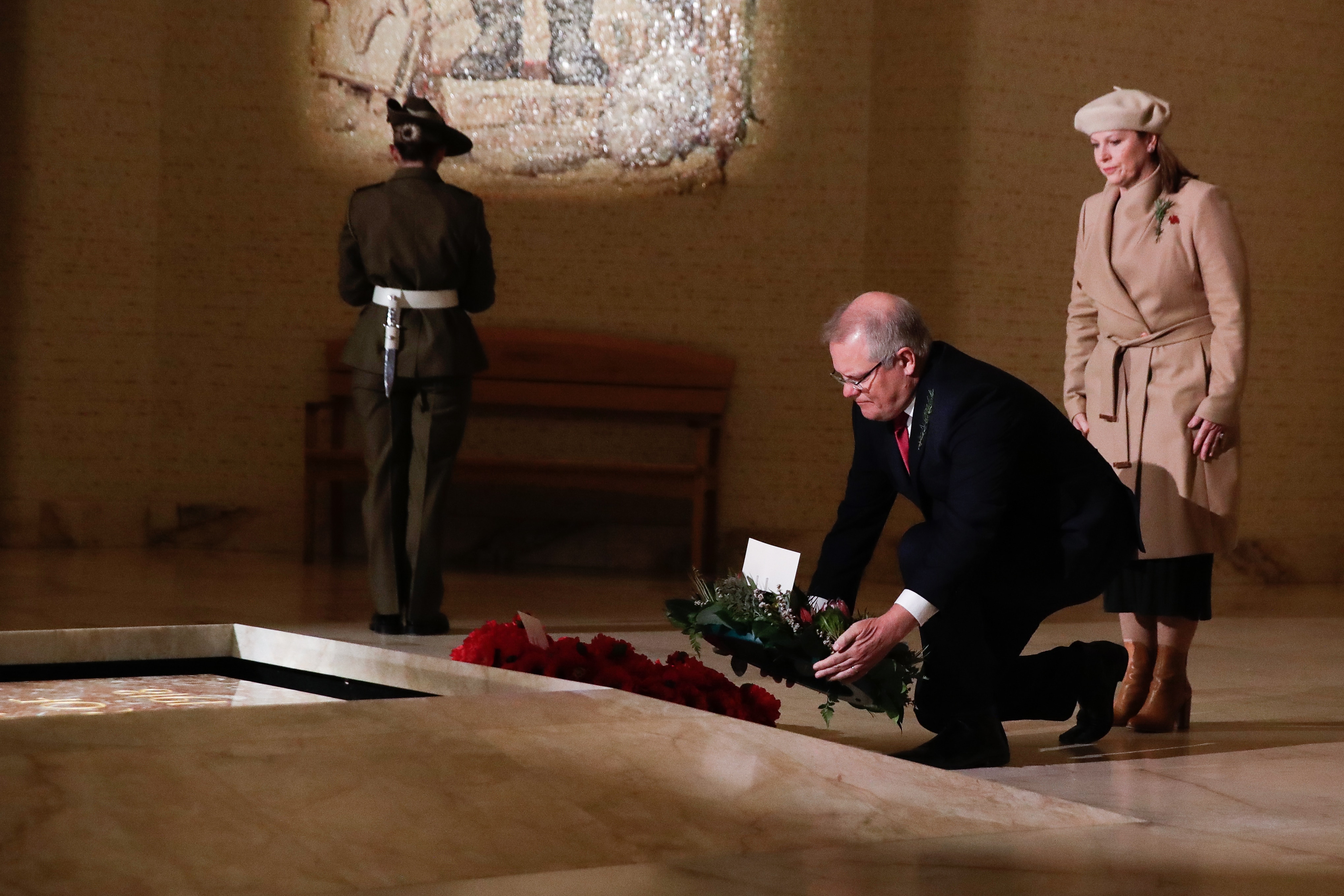 Prime Minister Scott Morrison and Jenny Morrison lay a wreath at the Tomb of the Unknown Australian Soldier during the Anzac Day commemorative service.