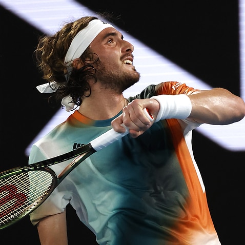 Stefanos Tsitsipas of Greece celebrates after defeating Taylor Fritz of the U.S. in their fourth round match at the Australian Open tennis championships in Melbourne, Australia, Tuesday, Jan. 25, 2022. (AP Photo/Tertius Pickard)