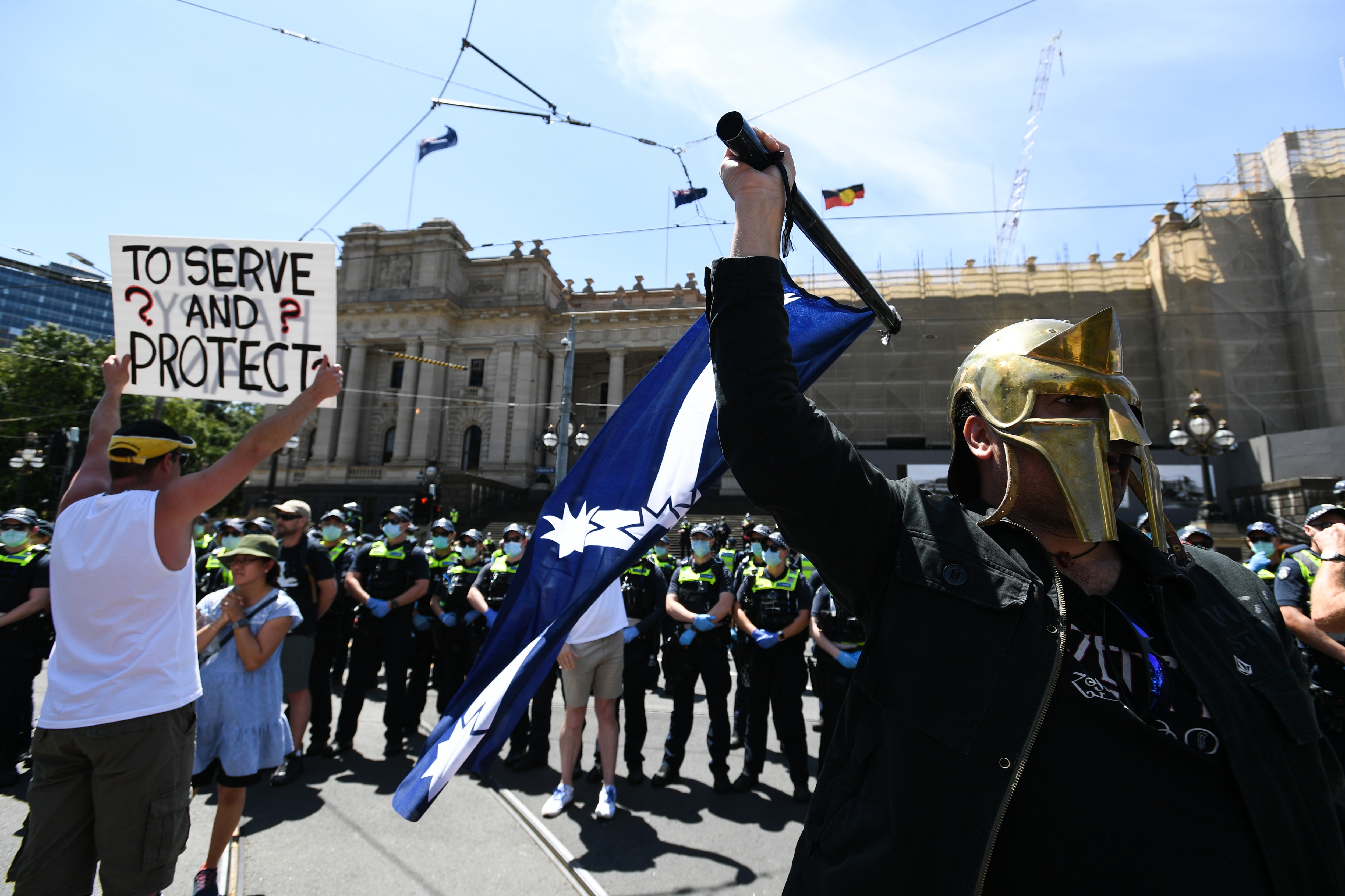 Protesters are seen during an anti-lockdown protest in Melbourne.