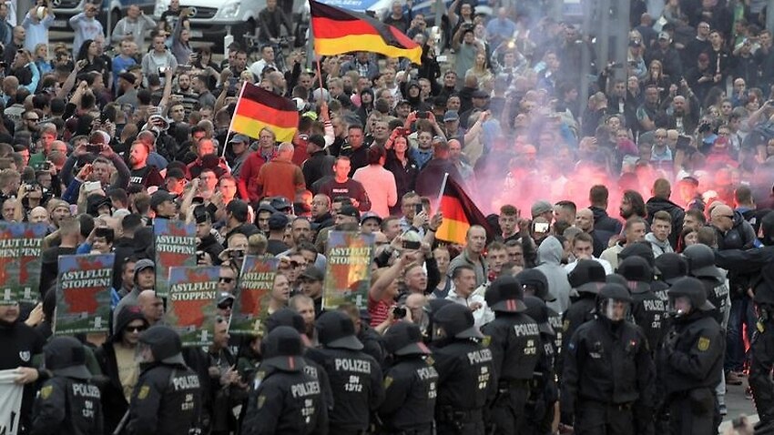 Image for read more article 'German leader Angela Merkel condemns 'hate in the streets''