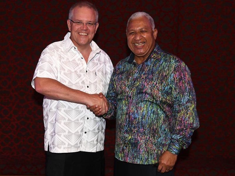 Fiji's PM Frank Bainimarama has told Scott Morrison Australia has to do better on climate change. (AAP)