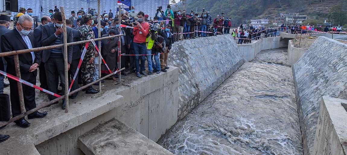 PM Oli and others inspecting Melamchi river water canal