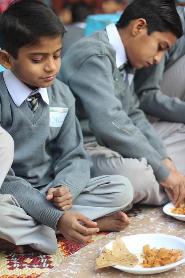 Kids having free lunch at school