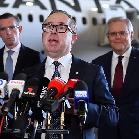Qantas Group CEO Alan Joyce (centre) with Prime Minister Scott Morrison (right) and NSW Premier Dominic Perrottet (left).