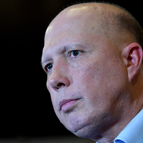 Peter Dutton is seen during a press conference at the Golden Lane Chinese Restaurant in Brisbane, Friday, February 28, 2020