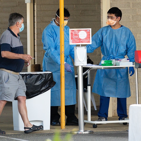 Medical staff are seen at a quiet Covid-19 testing centre at Sir Charles Gairdner Hospital in Perth.