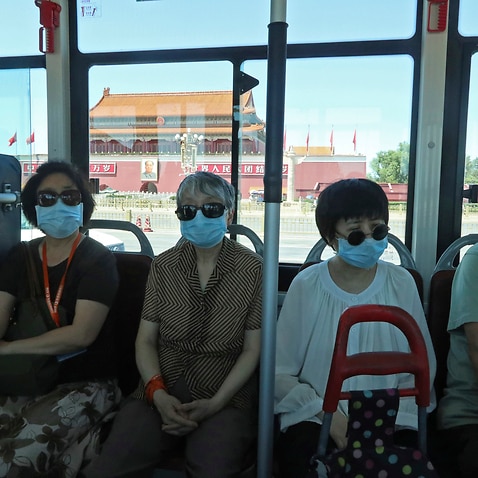 People wears masks in Beijing, China on 14 June, 2020. ( The Yomiuri Shimbun via AP Images )