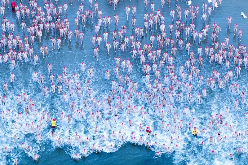 Record number of solstice swimmers bare all in Hobart SBS News