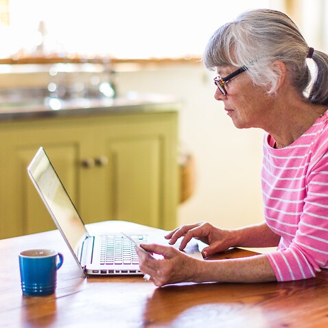 Older person with laptop