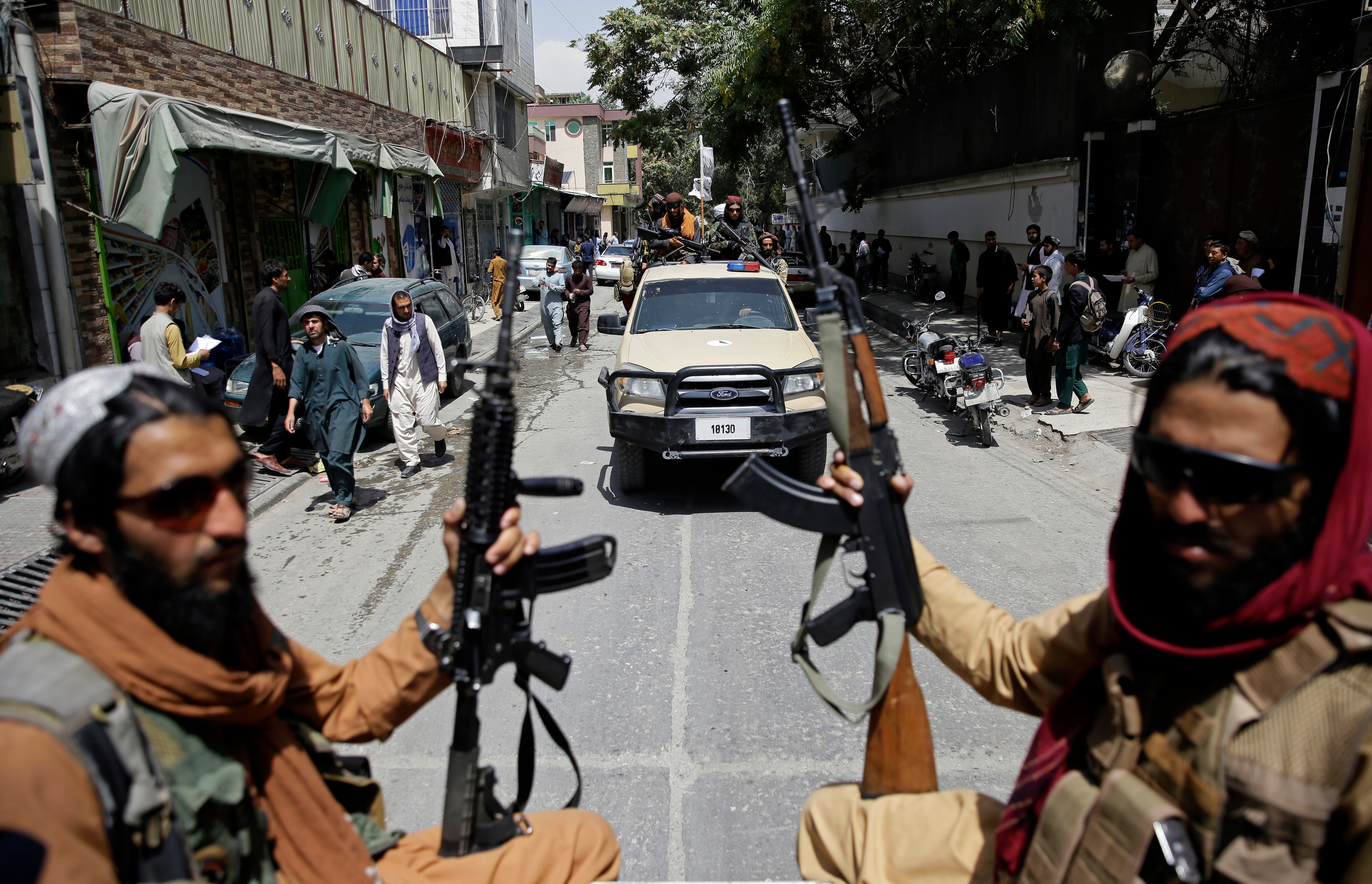 Taliban fighters patrol Kabul, Afghanistan, Thursday, Aug. 19, 2021. 