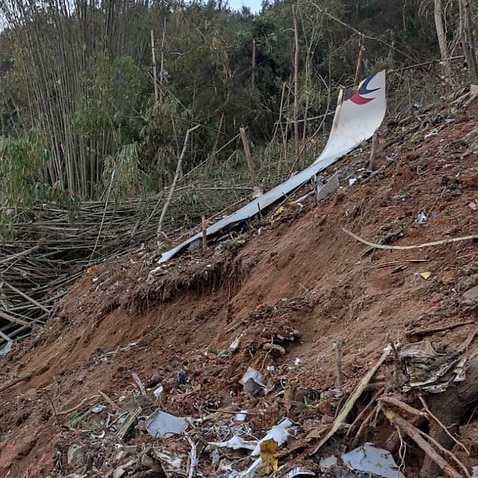 A piece of wreckage of China Eastern's flight MU5735 is seen after the plane crashed on the mountains in southern China