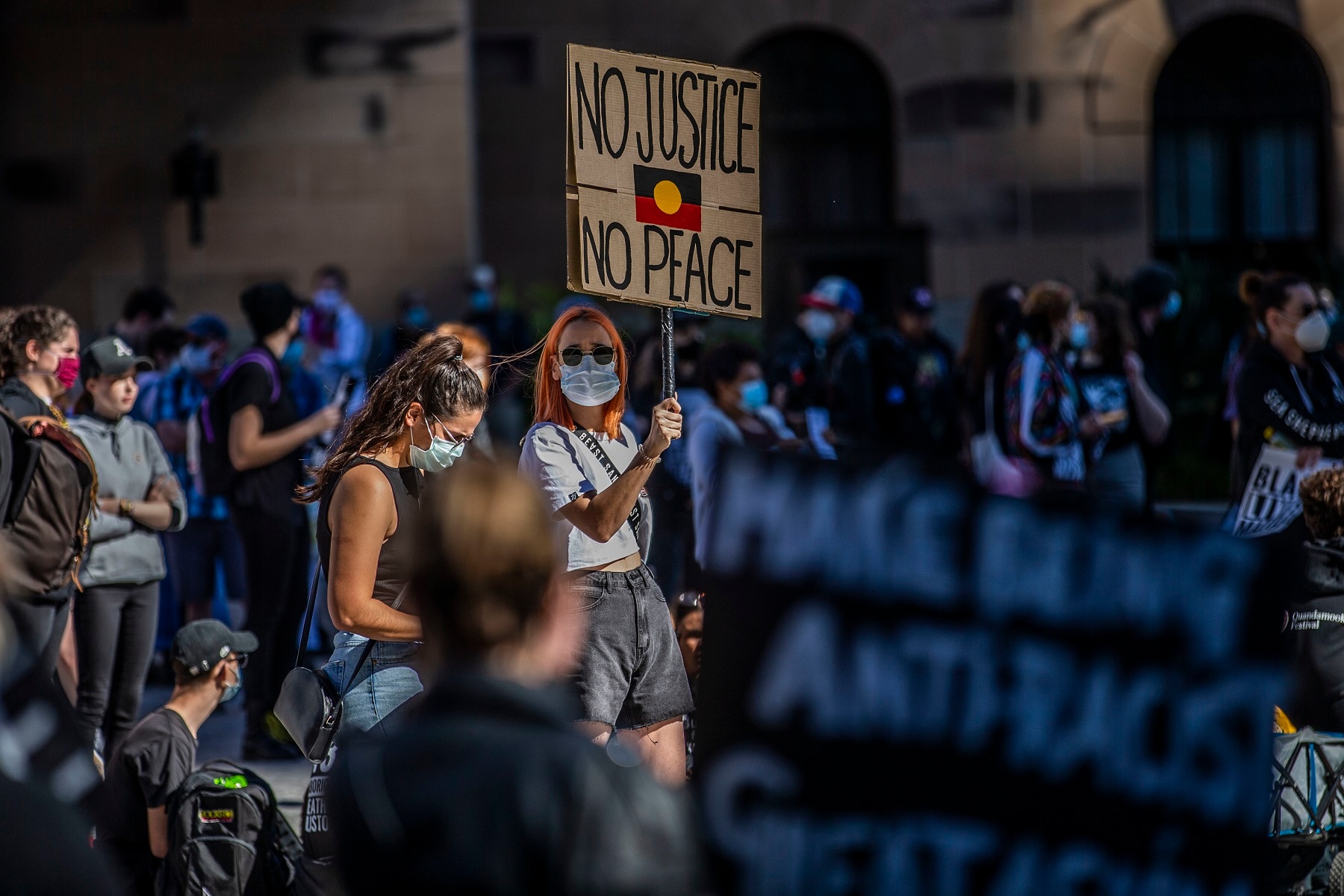 Protesters participate in a Black Lives Matter (BLM) rally at King George Square in Brisbane.