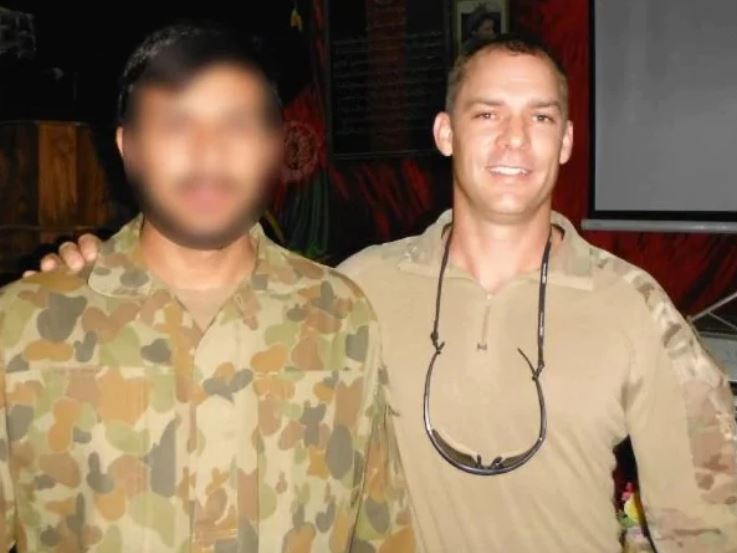 Captain Jason Scanes and his Afghan interpreter.