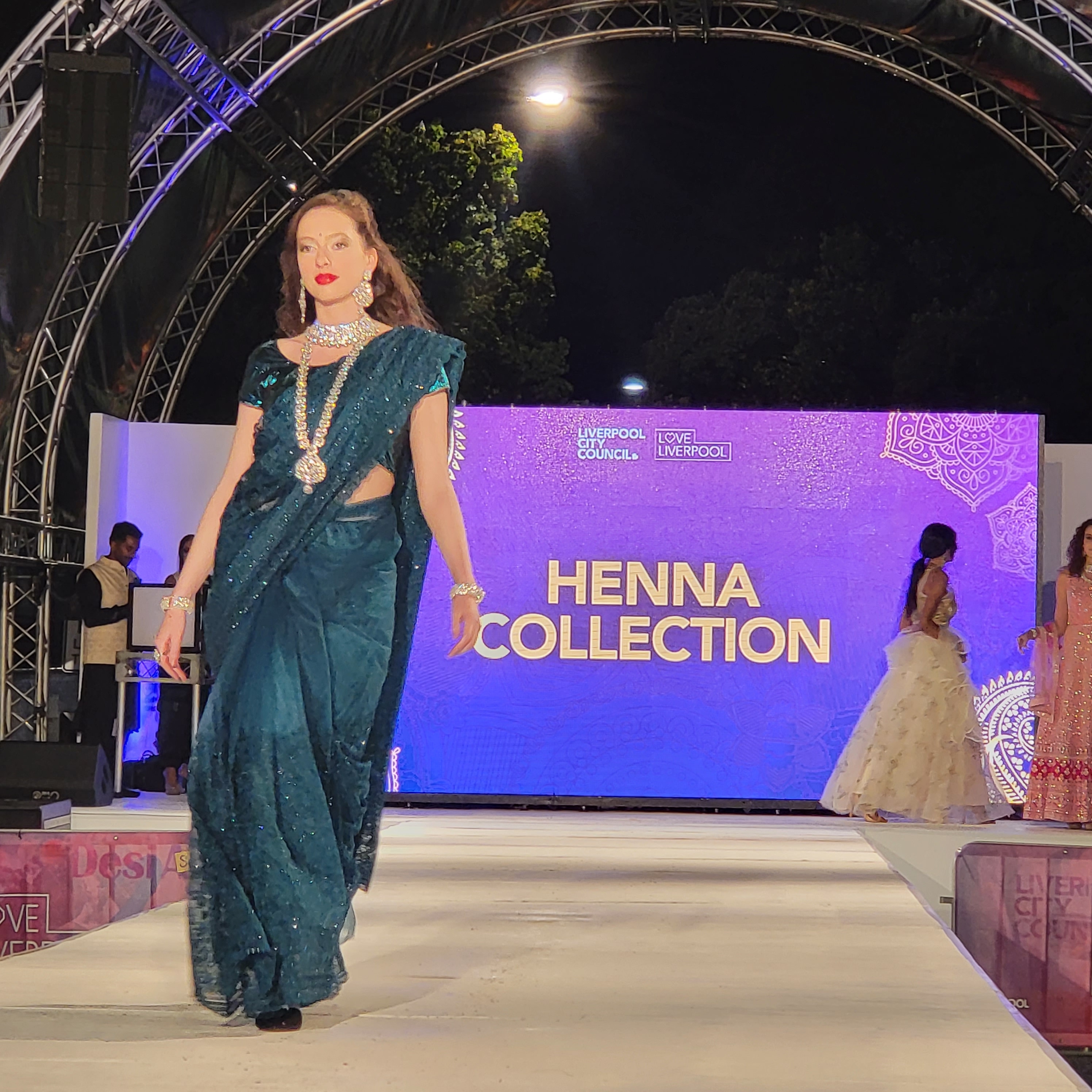 Models run the ramp showcasing the creations of local business owners on Starry Sari Night. 