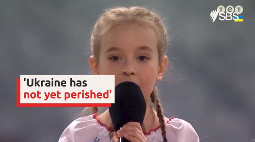 Seven-year-old girl sings Ukrainian national anthem in moving charity event performance
