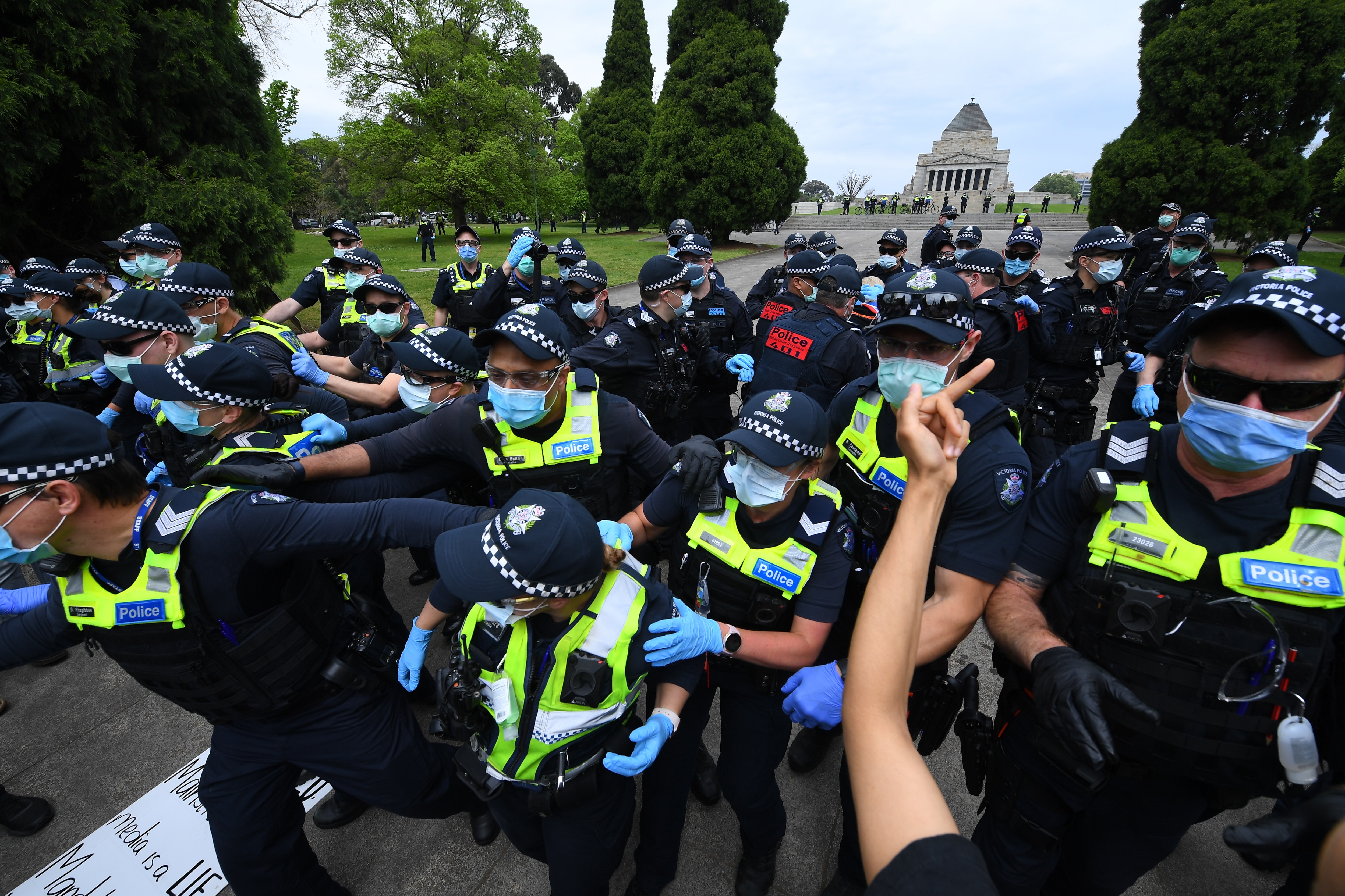 Police used pepper spray amid scuffles with demonstrators at an anti-lockdown protest in Melbourne.