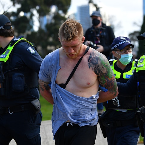 Protesters are seen at the Shrine of Remembrance in Melbourne, Saturday, September 5, 2020. Anti lockdown protests are planned at various locations in Melbourne CBD, including the Shrine of Remembrance.  (AAP Image/James Ross) NO ARCHIVING