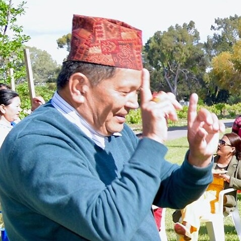 Visiting Nepali Parents in a park in Adelaide enjoying a community Barbecue event 