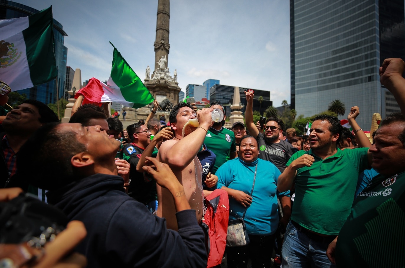 Mexicans celebrate at the Angel of Independence after the Mexico National Team victory over Germany
