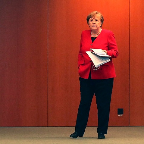 German Chancellor Angela Merkel waits for the beginning of a press conference in Berlin