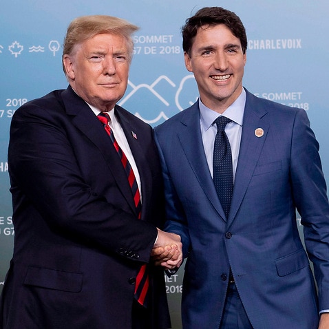 Canada's Prime Minister Justin Trudeau meets with U.S. President Donald Trump at the G7 leaders summit on June 8, 2018.