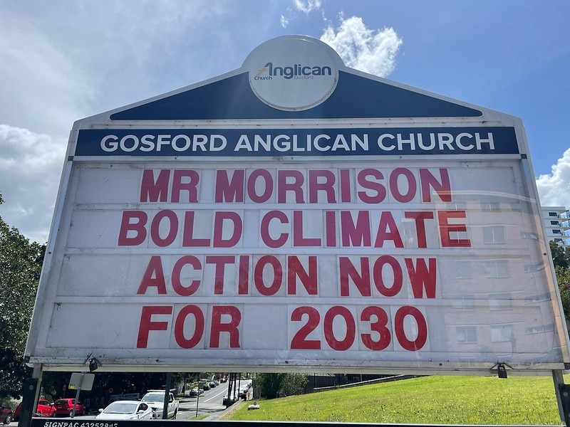 A sign outside Gosford Anglican Church, NSW, Australia, calls for Prime Minister Scott Morrison to act on climate change.