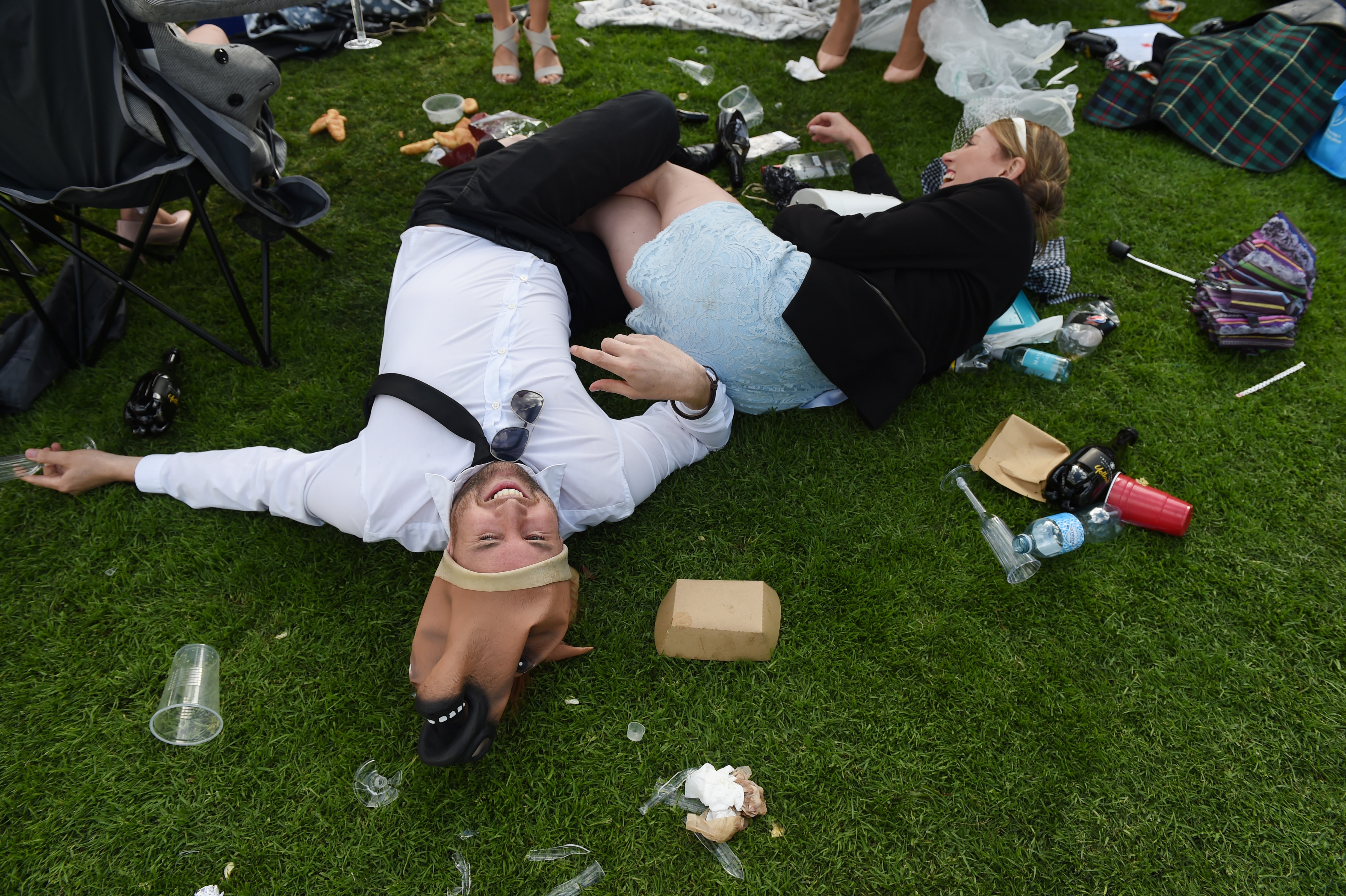 Revellers at the end of Derby Day, part of the Melbourne Cup festival, in 2014.