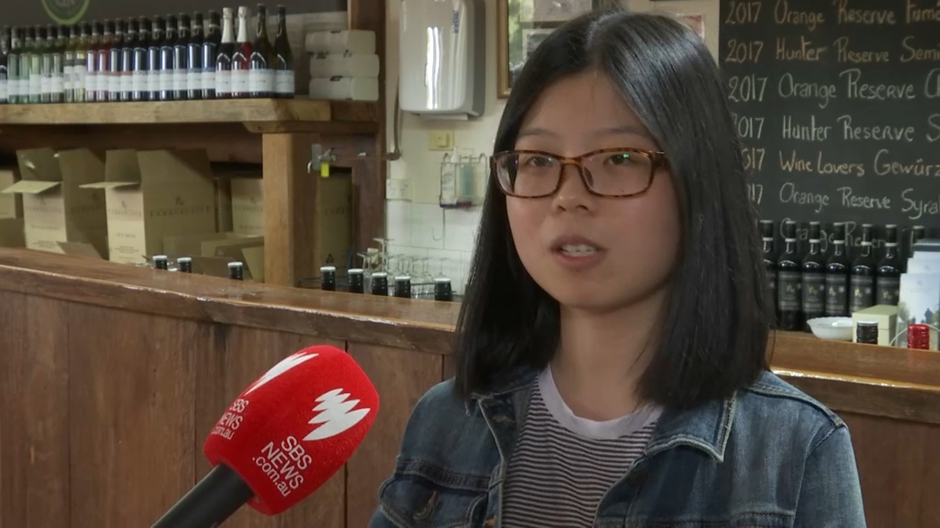 Feifei Wang helps service Mandarin-speaking customers at the cellar door. 