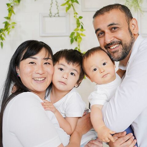 Mari Suzuki, a Sydney-based Japanese mum of two, with her family.  Her elder son, 2-year-old Kai, has Hirschsprung's disease.
