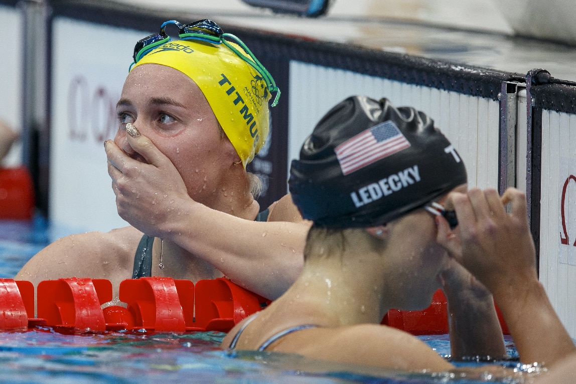 Australia's Ariarne Titmus and the US' Katie Ledecky take gold and silver respectively in the women's 400m freestyle final.