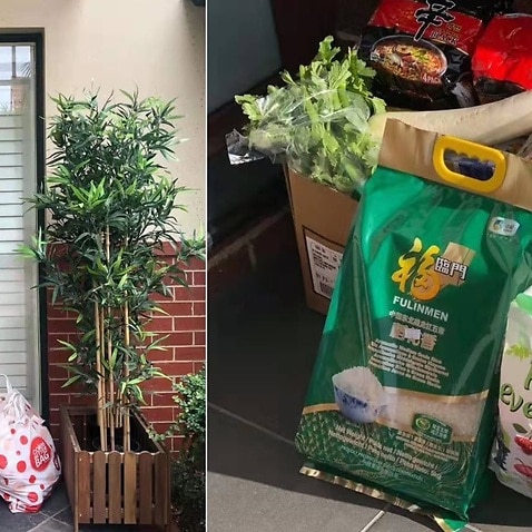 Grocery bags left at the homes of people self quarantining. 