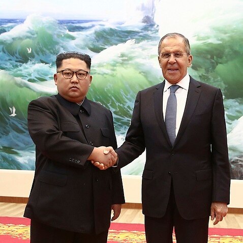 Korean leader Kim Jong-un, left, and Russia's Foreign Minister Sergei Lavrov pose for a photo during a meeting in Pyongyang, North Korea.