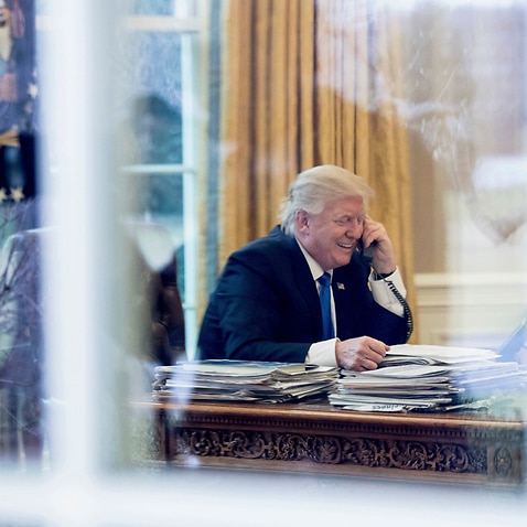 Donald Trump speaks on the phone with German Chancellor Angela Merkel