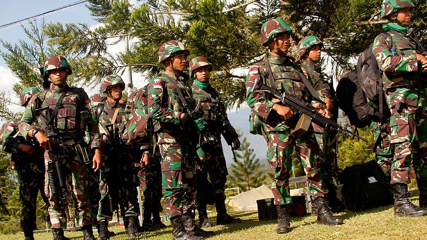 Indonesian troops prepare to be deployed to Nduga district where suspected separatists shot dead dozens of workers at a field in Wamena, Papua.