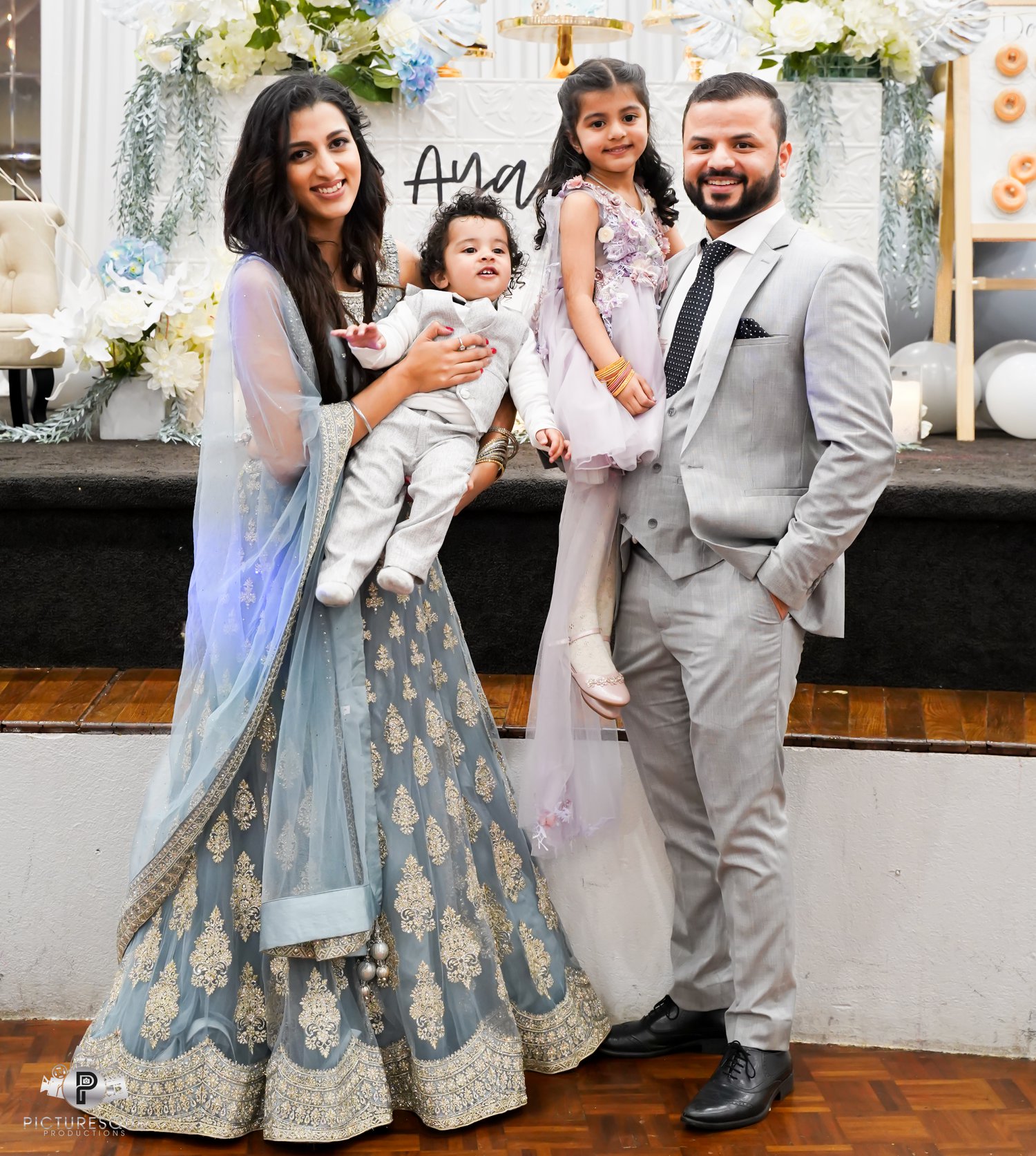Melbourne-based lawyer Mannie Kaur Verma with her husband and their children.