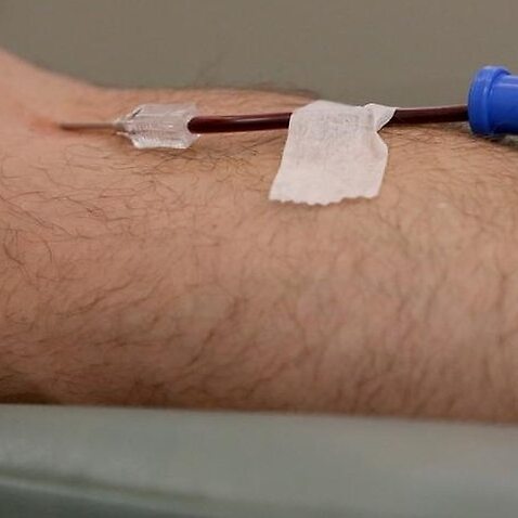 Image of a person giving blood