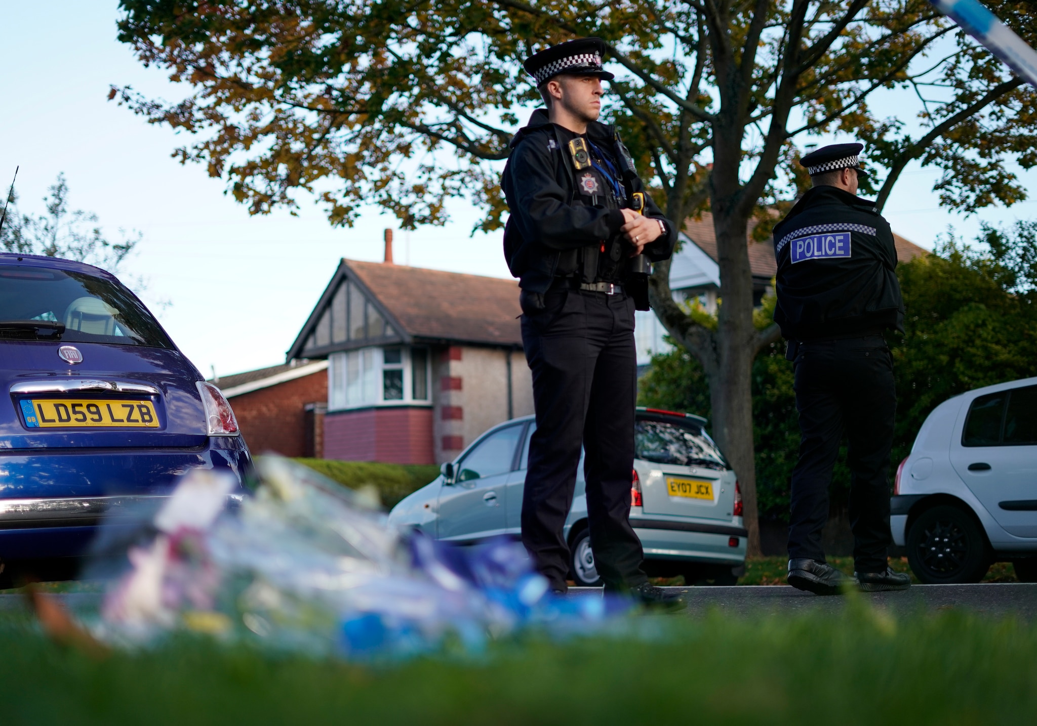 Police officers block one of the roads leading to the Belfairs Methodist Church